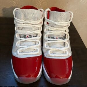 Air Jordan Retro 11 Cherry size 7 youth which is 8.5 in women’s.